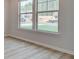 Bright living room featuring a large double windows and views of the neighborhood at 308 Moab Ct, Stockbridge, GA 30281