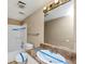Bathroom featuring tiled shower, toilet and vanity with granite countertop at 6404 Eastbriar Dr, Lithonia, GA 30058
