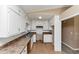 View of kitchen featuring cabinets and tile floors at 6404 Eastbriar Dr, Lithonia, GA 30058