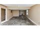 Room featuring neutral paint and trim with access to closet and window at 6404 Eastbriar Dr, Lithonia, GA 30058