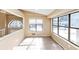 Bright sunroom with lots of windows and tile floors at 6404 Eastbriar Dr, Lithonia, GA 30058
