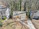 Aerial view of a home with a deck shows the roof, yard and nearby houses at 1038 Orlando Sw Pl, Atlanta, GA 30311