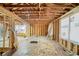 Exposed framing with unfinished walls and ceiling, revealing open space ready for customization at 1038 Orlando Sw Pl, Atlanta, GA 30311