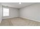 Bright and airy bedroom featuring neutral carpeting and ample natural light at 2090 Manhattan Pkwy, Decatur, GA 30035