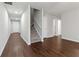 Inviting foyer with hardwood floors, staircase, and access to living spaces at 2090 Manhattan Pkwy, Decatur, GA 30035