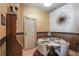 Dining area with a round table, modern chairs, and decorative wall art at 3445 Stratford Ne Rd # 2305, Atlanta, GA 30326