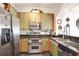 Charming kitchen with unique cabinetry, stainless steel appliances, and modern countertops at 3445 Stratford Ne Rd # 2305, Atlanta, GA 30326