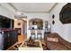 Bright living room with hardwood floors, a breakfast bar, and contemporary decor at 3445 Stratford Ne Rd # 2305, Atlanta, GA 30326