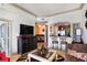 Open-concept living room with a breakfast bar and views into the dining area, perfect for entertaining at 3445 Stratford Ne Rd # 2305, Atlanta, GA 30326