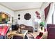 Cozy living area featuring hardwood floors, a comfortable sofa, and modern decor at 3445 Stratford Ne Rd # 2305, Atlanta, GA 30326