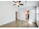 Bedroom featuring a vaulted ceiling, ceiling fan, and doorways to other rooms at 12 Saint Georges Pl, Sharpsburg, GA 30277