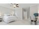 Serene bedroom with neutral walls, plush carpet, ceiling fan and study desk with chair at 1918 Coal Pl, Atlanta, GA 30318