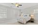 Bright bedroom with ceiling fan, and three windows offering plenty of natural light at 1918 Coal Pl, Atlanta, GA 30318