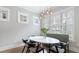 Elegant dining area with modern lighting, ample natural light, and stylish seating at 1918 Coal Pl, Atlanta, GA 30318