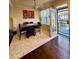 Inviting dining room with hardwood floors, large window, and modern furnishings at 6642 Story Circle Cir, Norcross, GA 30093