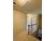 Hallway with neutral colored carpet and white trim at 6642 Story Circle Cir, Norcross, GA 30093