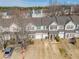 Aerial view of townhomes featuring neat yards and a tree-lined neighborhood at 820 Ash St, Canton, GA 30114