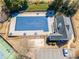 Birds eye view of tennis courts and community pool with a covered top at 820 Ash St, Canton, GA 30114