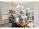 Open concept dining room adjacent to the kitchen with natural light and tile flooring at 820 Ash St, Canton, GA 30114