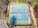 Overhead view of outdoor tennis courts featuring pristine nets and ample lighting at 820 Ash St, Canton, GA 30114