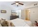 Cozy bedroom featuring a dresser and natural light from the door and window at 850 Moores Mill Nw Rd, Atlanta, GA 30327