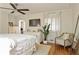 Relaxing main bedroom with a ceiling fan, hardwood floors, and a seating area for added comfort at 850 Moores Mill Nw Rd, Atlanta, GA 30327