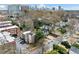 An elevated view of a residential neighborhood with lush greenery, well-maintained homes and apartment buildings in a quiet street at 1903 Anjaco Nw Rd # 3, Atlanta, GA 30309