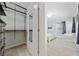 Bedroom featuring an organized walk-in closet and neutral walls at 1903 Anjaco Nw Rd # 3, Atlanta, GA 30309