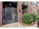 Secured wrought iron gate leads to courtyard, providing added security and curb appeal at 1903 Anjaco Nw Rd # 3, Atlanta, GA 30309