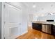 View of kitchen with stainless steel appliances, granite countertops and access door at 1903 Anjaco Nw Rd # 3, Atlanta, GA 30309