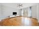 Spacious living room with hardwood floors and large window at 1903 Anjaco Nw Rd # 3, Atlanta, GA 30309