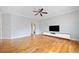 Living room features hardwood floors, large windows, and media center at 1903 Anjaco Nw Rd # 3, Atlanta, GA 30309