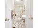 Compact bathroom featuring a stand-up shower, toilet, and pedestal sink at 3200 Fence Rd, Dacula, GA 30019