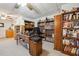 Home office featuring built-in bookshelves, a desk, and carpeted flooring at 3200 Fence Rd, Dacula, GA 30019