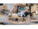 Bird's-eye view capturing a backyard with pool, deck, and home nestled within mature trees at 3215 Belford Dr, Marietta, GA 30066