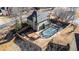 Aerial view of backyard pool, deck, and privacy fence surrounding home at 3215 Belford Drive, Marietta, GA 30066