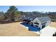 Aerial view of home featuring a spacious yard, basketball court, playground, and guest house at 590 Hood Ave, Fayetteville, GA 30214