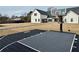 Backyard basketball court alongside modern farmhouse at 590 Hood Ave, Fayetteville, GA 30214