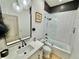 Stylish bathroom with marble countertop, glass-enclosed shower, and modern fixtures at 590 Hood Ave, Fayetteville, GA 30214