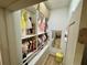 Well-organized closet with custom shelving, hanging racks, and storage baskets at 590 Hood Ave, Fayetteville, GA 30214