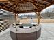 Inviting outdoor living space with fire pit, seating and playhouse in background at 590 Hood Ave, Fayetteville, GA 30214