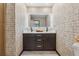 Modern bathroom with a double sink vanity, backlit mirror and decorative tile walls at 886 Cedar Creek Se Ct, Marietta, GA 30067