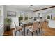 Elegant dining room featuring modern lighting, hardwood floors, and a neutral color palette at 10 Claire Se Dr, Atlanta, GA 30315