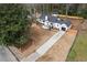 Charming home with a modern garage, complemented by a newly laid driveway and a spacious front yard at 10 Claire Se Dr, Atlanta, GA 30315