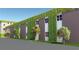 Modern exterior elevation featuring climbing ivy, clean window trim, and gray brick at 10 Claire Se Dr, Atlanta, GA 30315