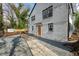 View of home with a brick facade, gravel pathway and a fenced yard, showcasing durability and privacy at 10 Claire Se Dr, Atlanta, GA 30315