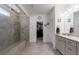 Bathroom featuring a luxurious tiled shower with dual shower heads at 1353 Dogleg Road, Marietta, GA 30066