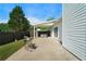 Inviting backyard featuring a covered patio and a rejuvenating hot tub for relaxation at 3047 Standing Rock Ct, Lithia Springs, GA 30122