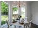 Charming breakfast nook with large windows and view of backyard at 3047 Standing Rock Ct, Lithia Springs, GA 30122