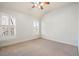 Spacious carpeted bedroom with vaulted ceiling and plantation-shuttered windows at 4305 Kendall Way, Roswell, GA 30075